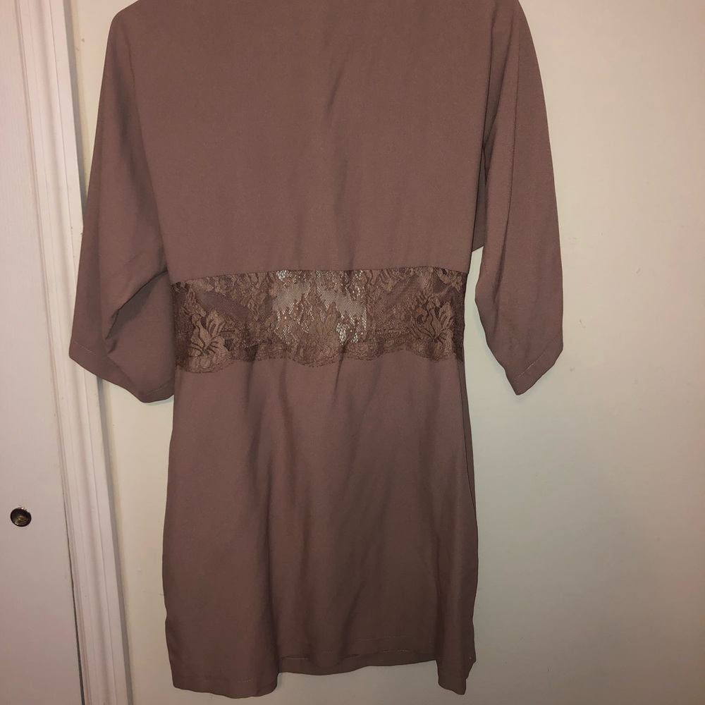 Quarter sleeve open back dress.